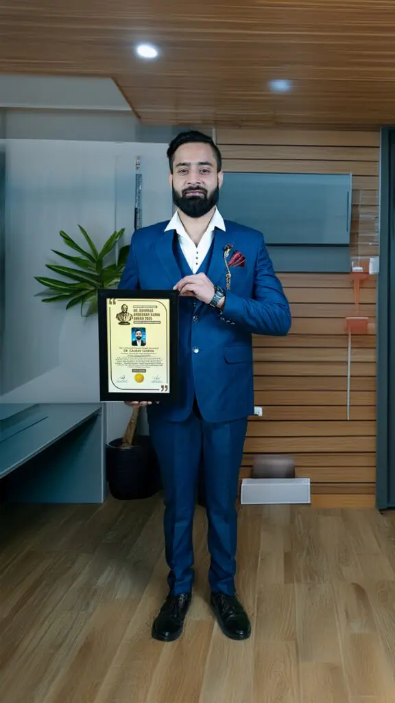 Dr Gaurav Saxena holding Ambedkar Ratna Award 2025 certificate for excellence in astrology numerology and vastu in India