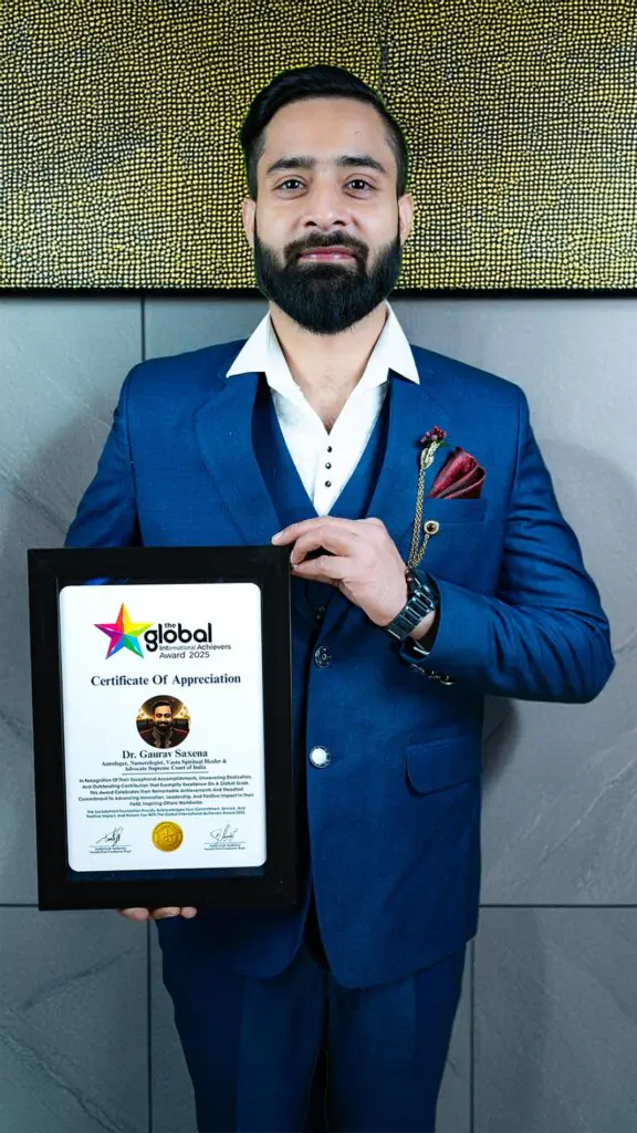Dr Gaurav Saxena holding Global International Achievers Award 2025 certificate for excellence in astrology and spiritual leadership