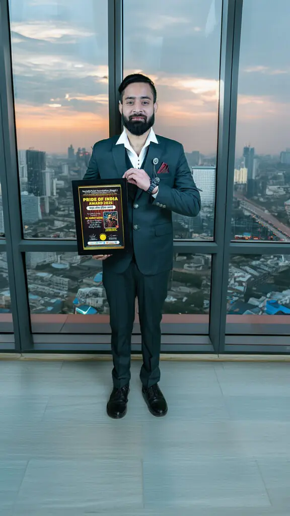 Dr Gaurav Saxena holding Pride of India Award 2025 certificate by Socially Point Foundation in a formal setting