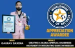 Gaurav Saxena holding Worldwide Book of Records certificate and trophy for global spiritual awareness achievement