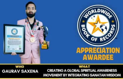 Gaurav Saxena holding Worldwide Book of Records certificate and trophy for global spiritual awareness achievement